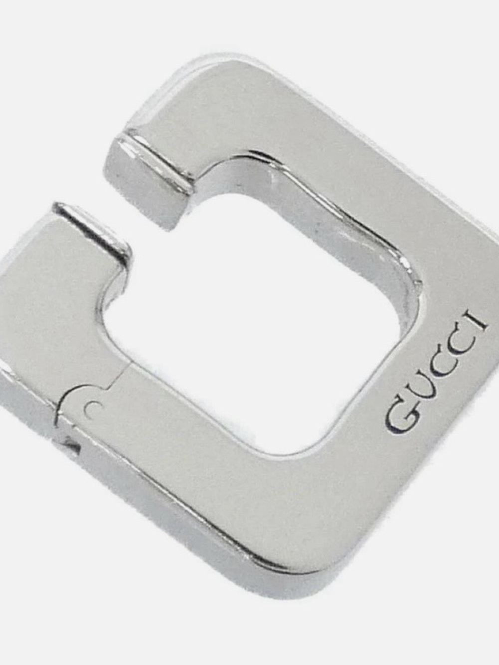 Gucci Silver Engraved Metal Charm Accent